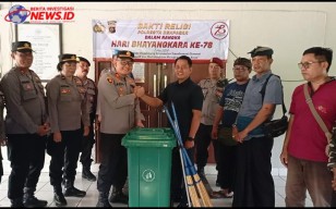 Bakti Religi Polsek Dentim Serahkan Sarkon kepada Gereja Kalvari