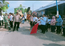 Bhabinkamtibmas Polsek Warujayeng Kawal Kirab Nyadran yang di Hadiri Bupati Nganjuk Marhaen DJumadi serta Rombongan
