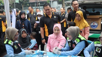 Polres Nganjuk Gelar Bakti Sosial Car Free Day, Wujud Nyata Pelayanan Publik di HUT Bhayangkara ke-79