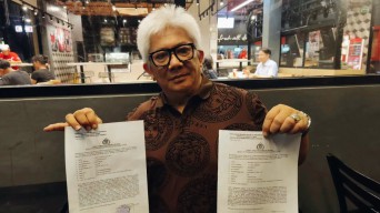 Kuasa Hukum Kakanwil BPN Sulut Laporkan Akun Medsos ke Polda Terkait Dugaan Fitnah Soal Alphard