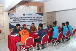 Dukung Pembinaan Kemandirian dan Inklusi Keuangan, Lapas Kelas I Madiun Serahkan Buku Tabungan dan ATM BRI